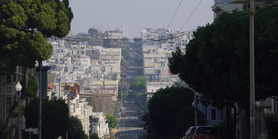 Driving on a street in a san francisco neighborhood at morning