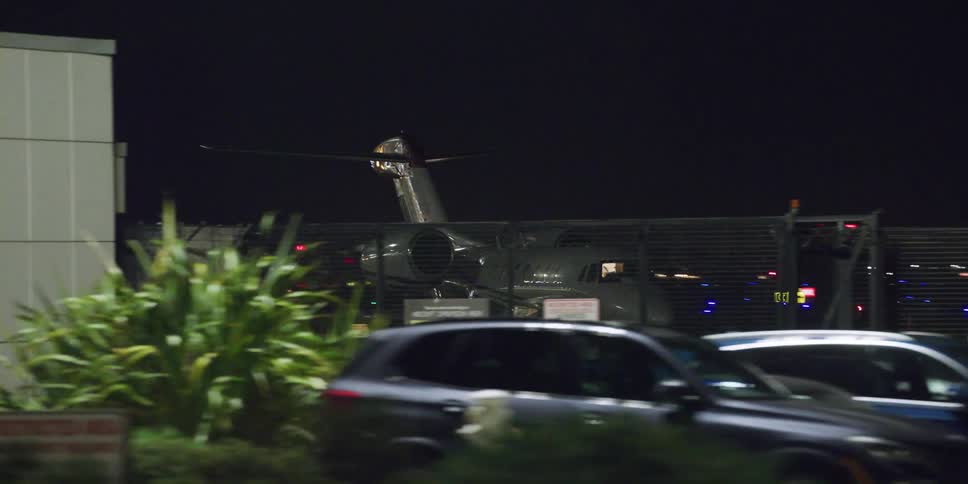 Driving by a private jet parked at the airport