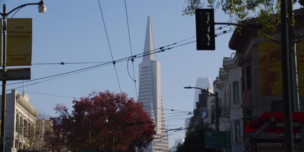 Tall tower building against the blue sky in the city