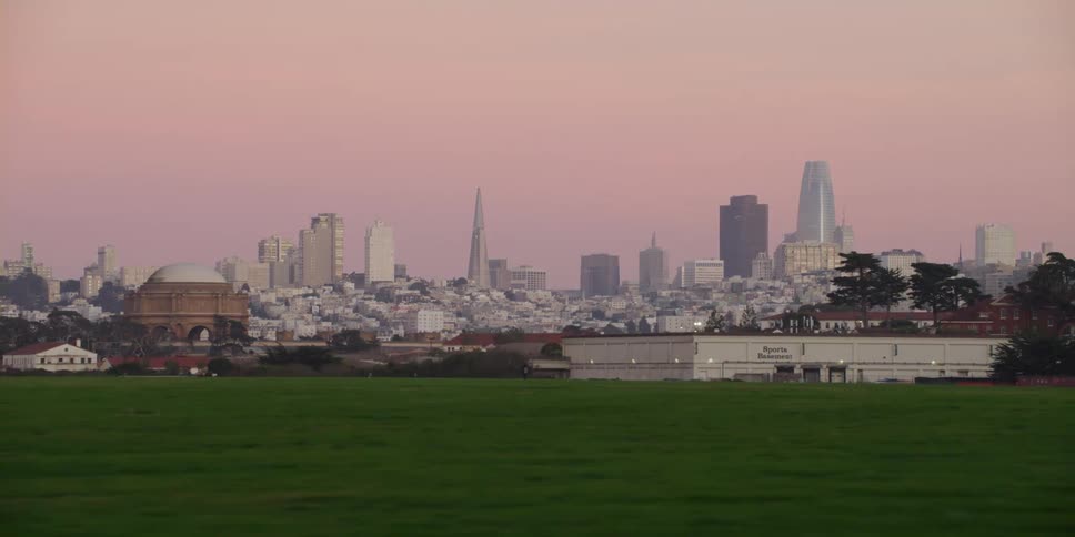 The view of big city at a distance from a park