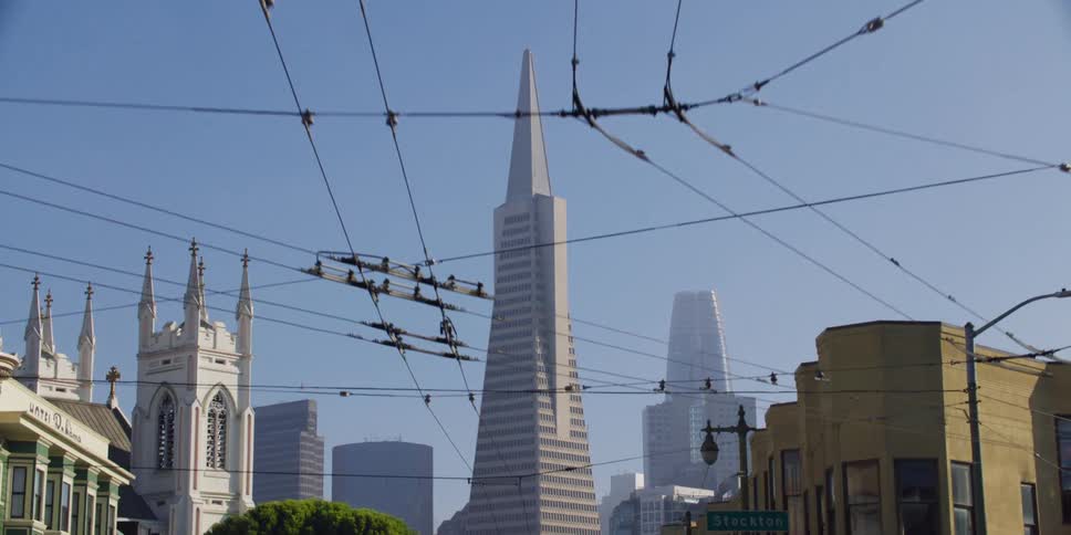 Tall buildings in a city are displayed during the daytime