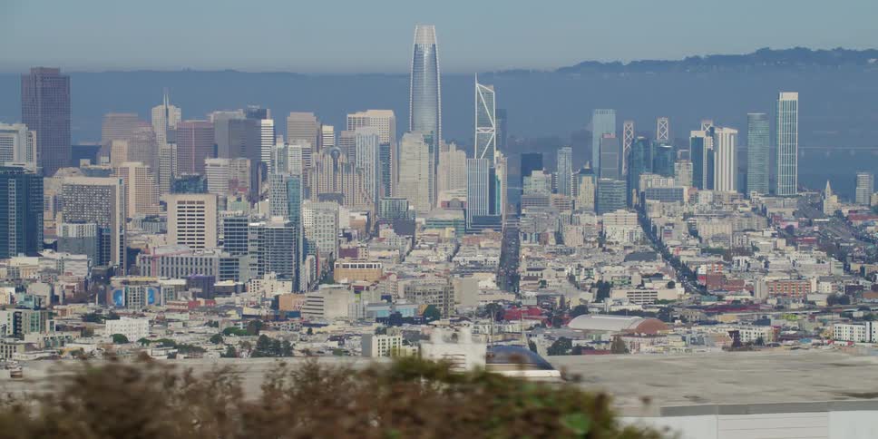 Aerial view of a downtown city is displayed