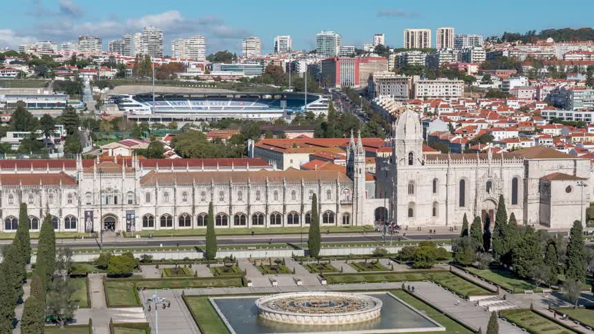 Big city with a historical building a park and a stadium at sight