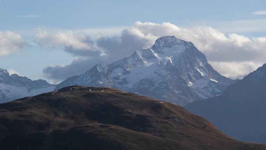 Aerial view of mountains are displayed during the daytime