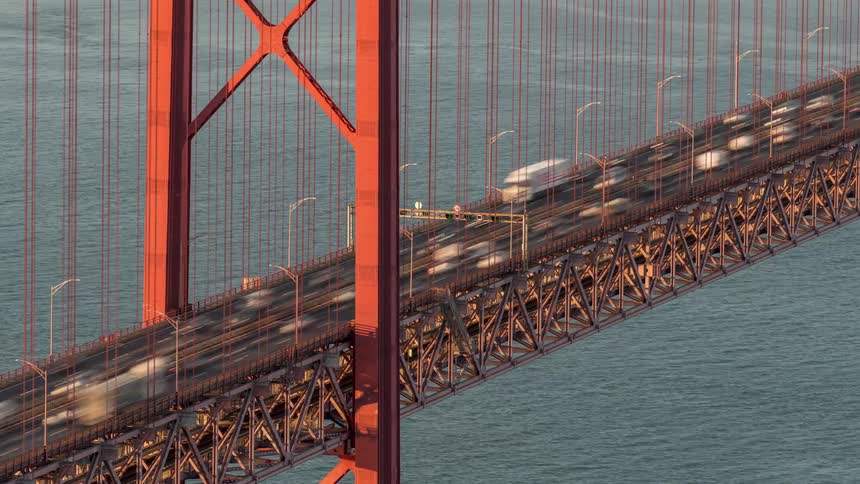 Time lapse of vehicles driving over the golden gate bridge over the bay