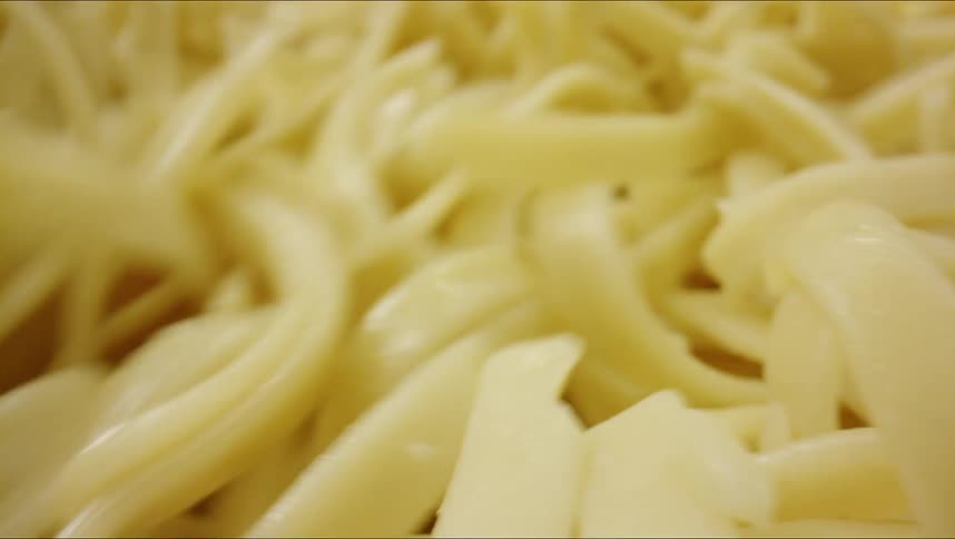 The linguine is being mixed