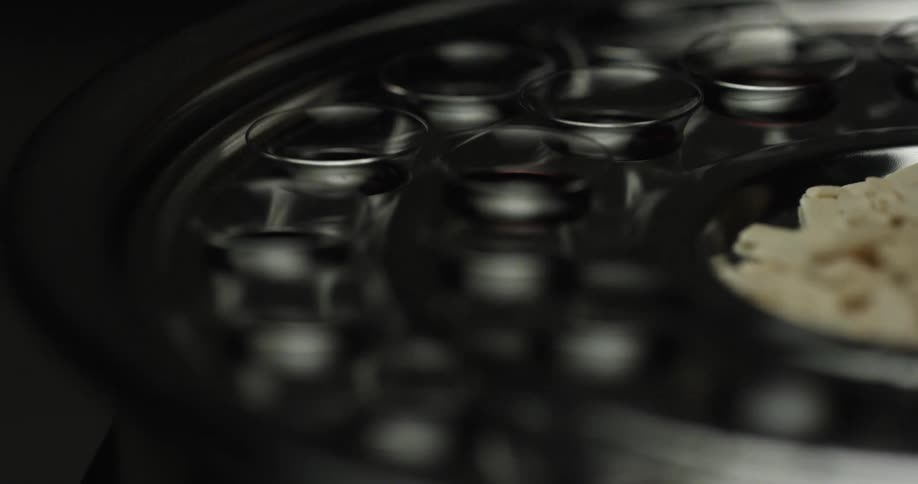 The glass platter has an item in the middle