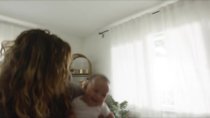 A family dance and move around at home