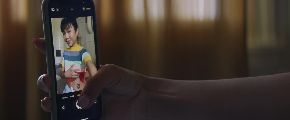Asian teenager girl taking a selfie with her smartphone
