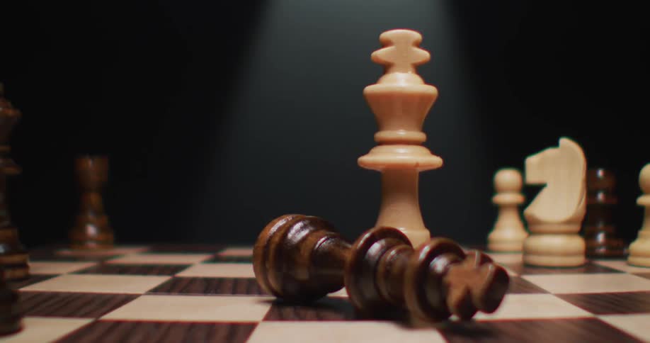 The chess piece is down on the board