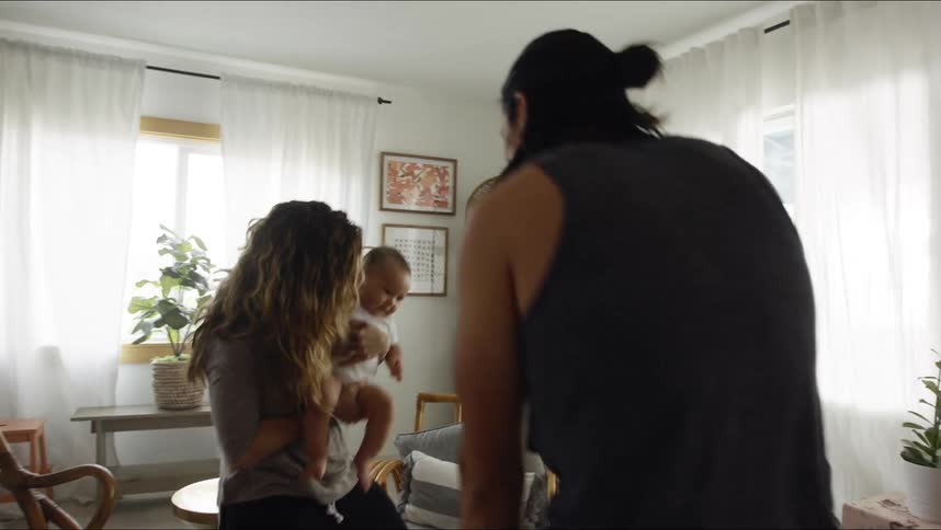 A family dance in the living room