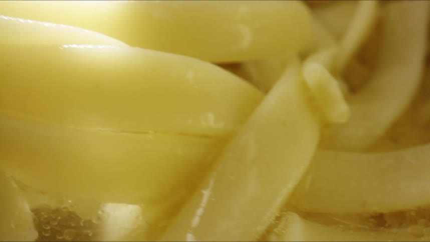 Pasta cooks in the bubbling water