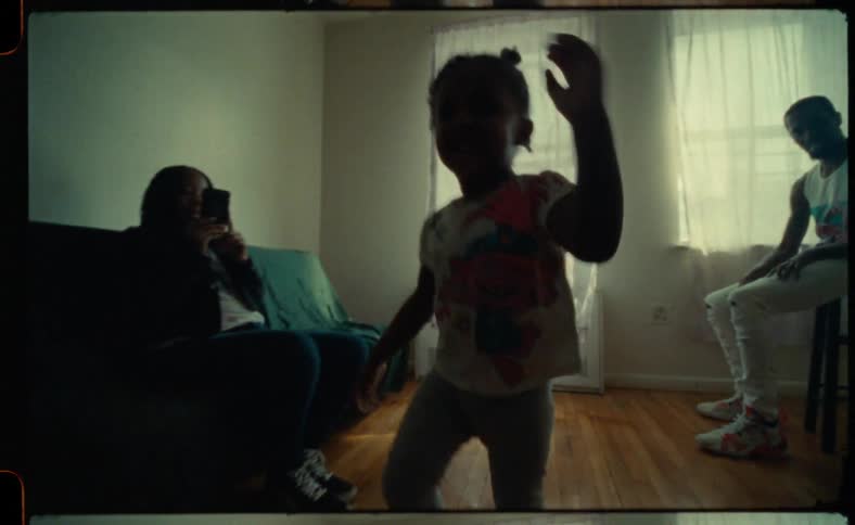 A girl dances in the room