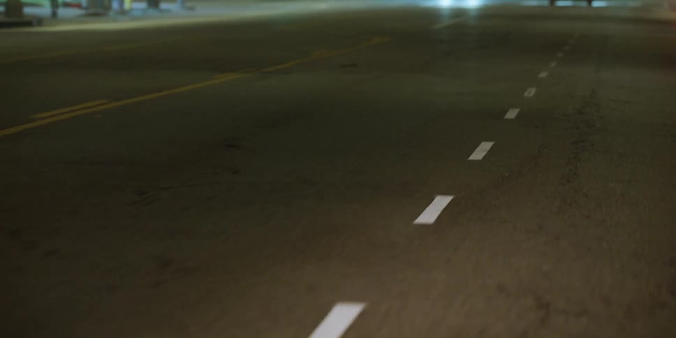 Traveling on a highway looking down at the lanes on the road