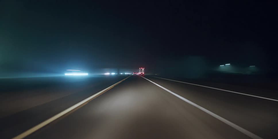 Time lapse night driving on freeway from a dash cam