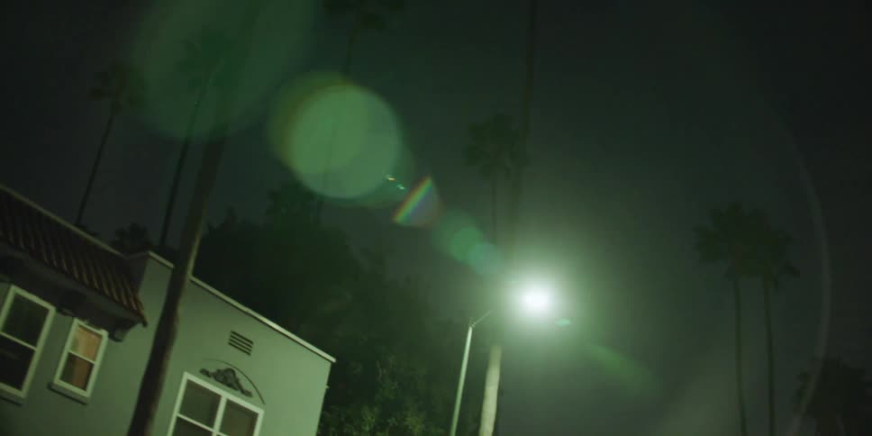 View of a downtown city is displayed at night