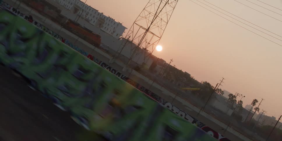 The sun is rising on the city