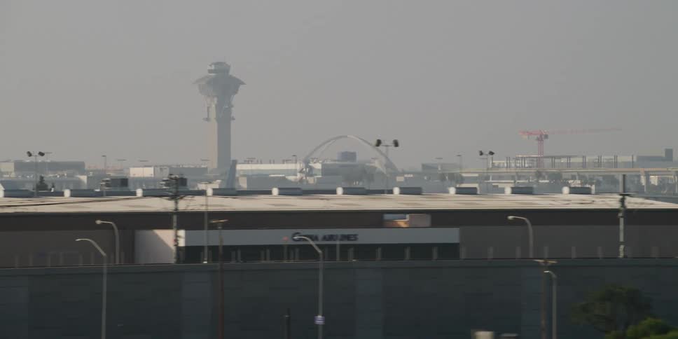 Aerial view of a city is displayed