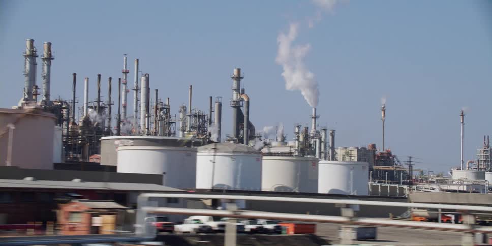 A factory is displayed in a city during spring