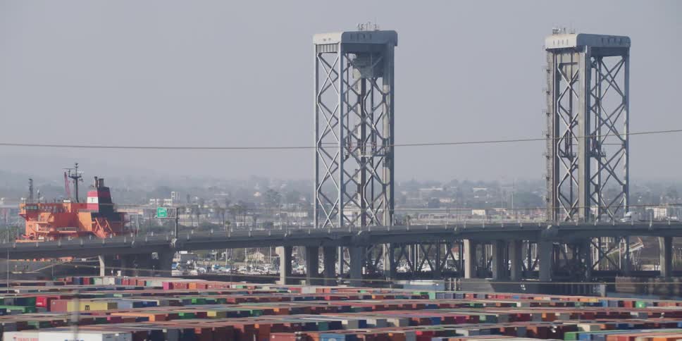 A bridge in a downtown city is displayed