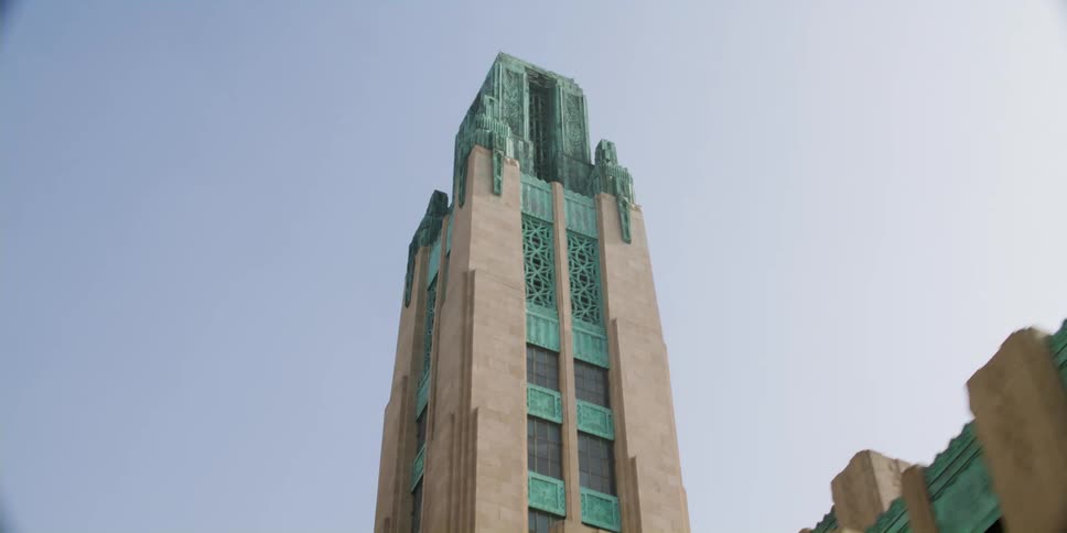 Tall buildings in a city are displayed during the day