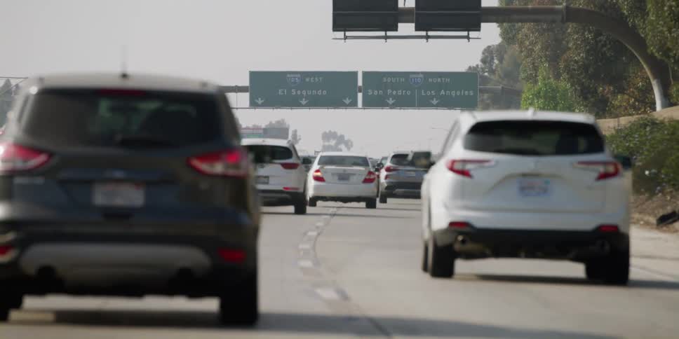 Vehicles commuting in traffic on freeway in los angeles