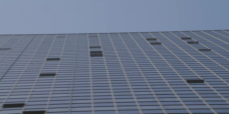 The tall building has many windows