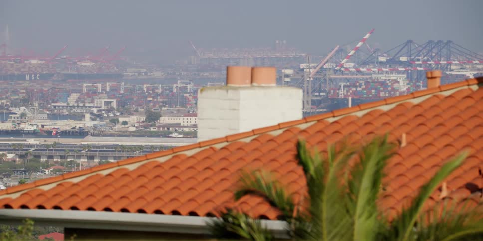Construction cranes and buildings in a city