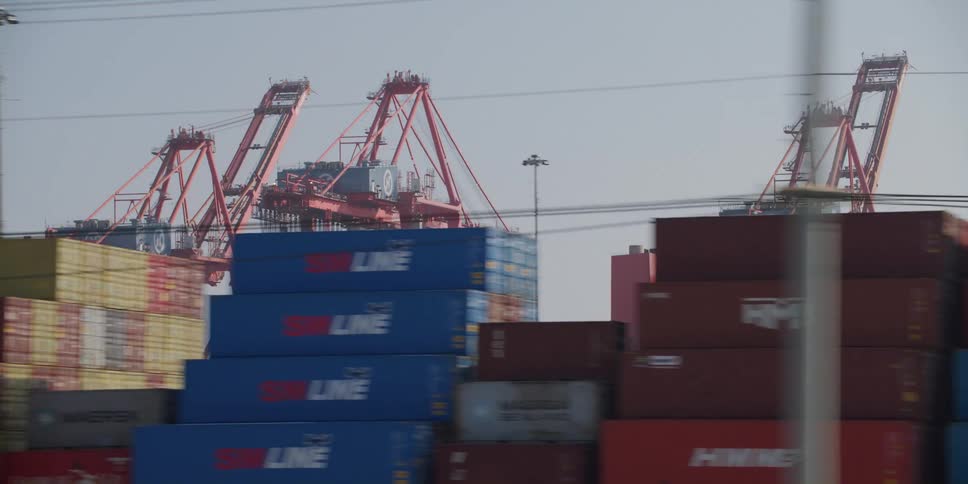 The port is filled with cargo containers
