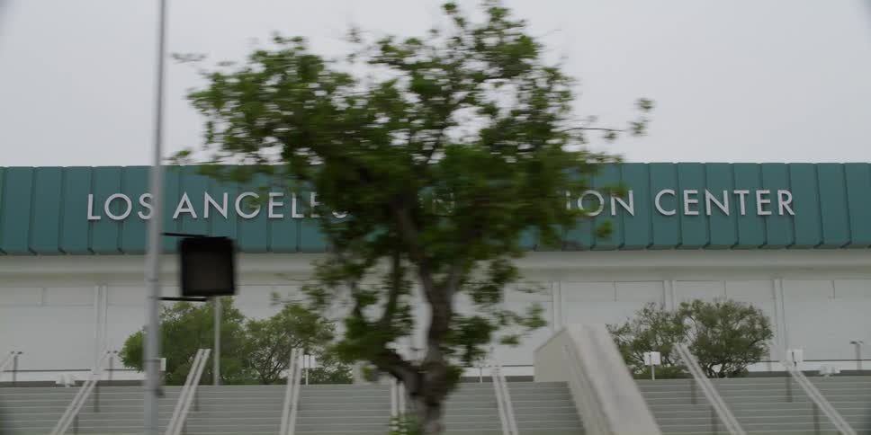 A convention center is displayed in a city