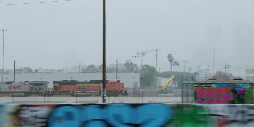 A train is traveling in the city