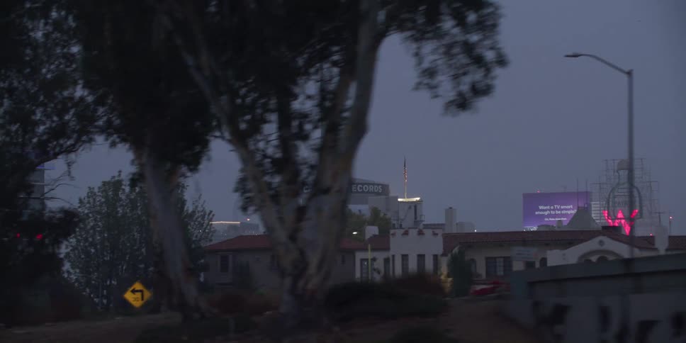 Fog is covering the city at sunset