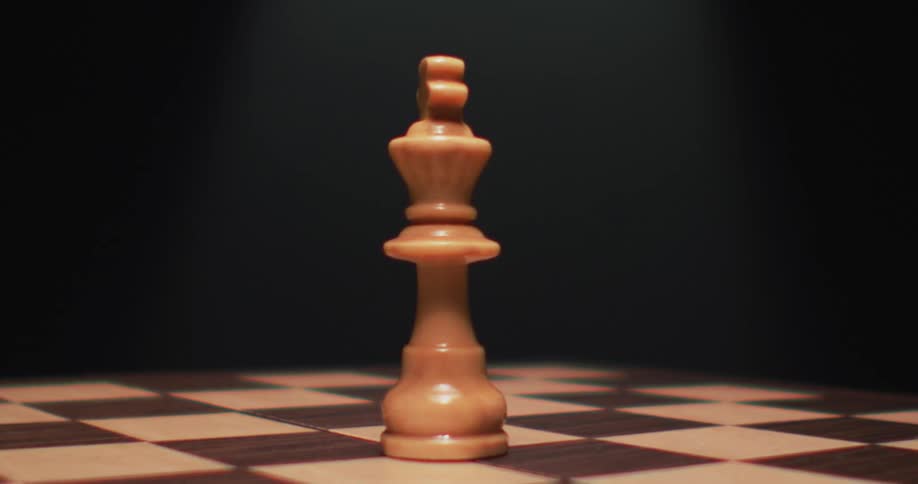 Close up view of a chess board game is displayed
