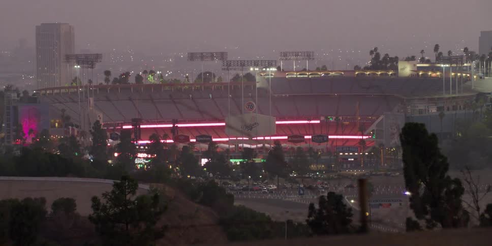 A view of buildings with red lights outdoors