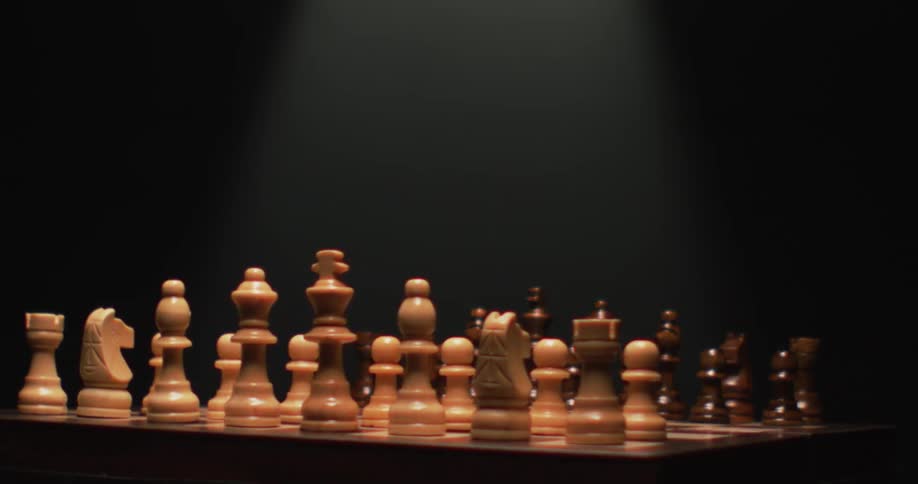 A chess board is set up ready to start a game