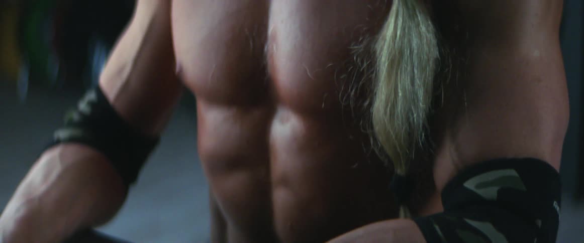 A man is working out in a gym