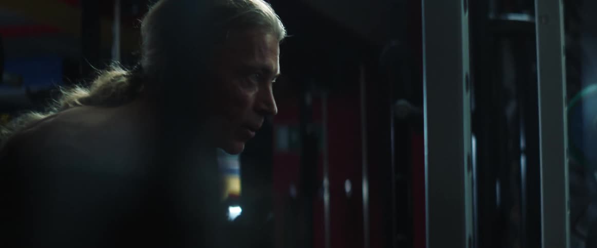 A man is working out in a gym
