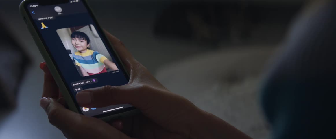 Girl takes selfie and sends to boyfriend on smartphone
