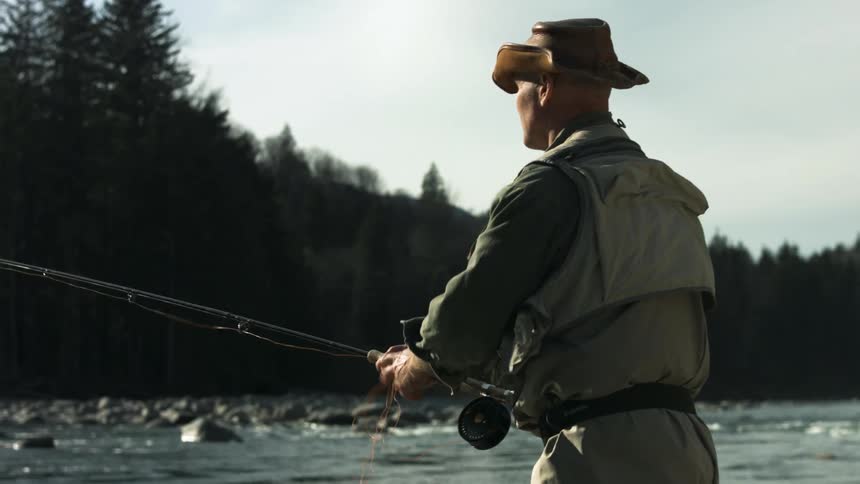 A man is fishing in the river