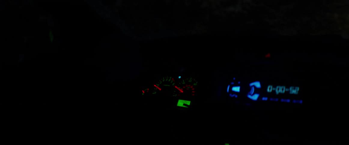 The vehicle is driving at night