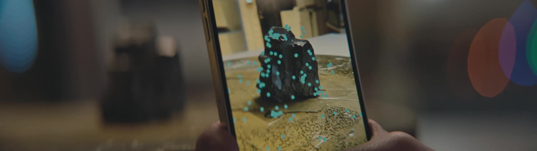 A person is filming an object with his phone