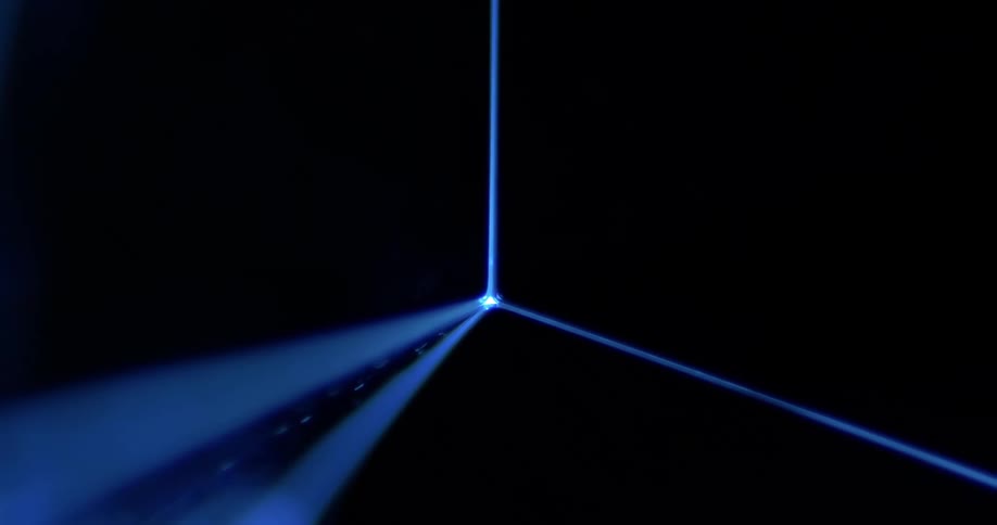 The blue laser is shining in the dark
