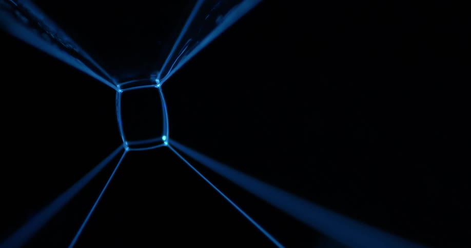 Blue lines and rectangular image contrasts with black