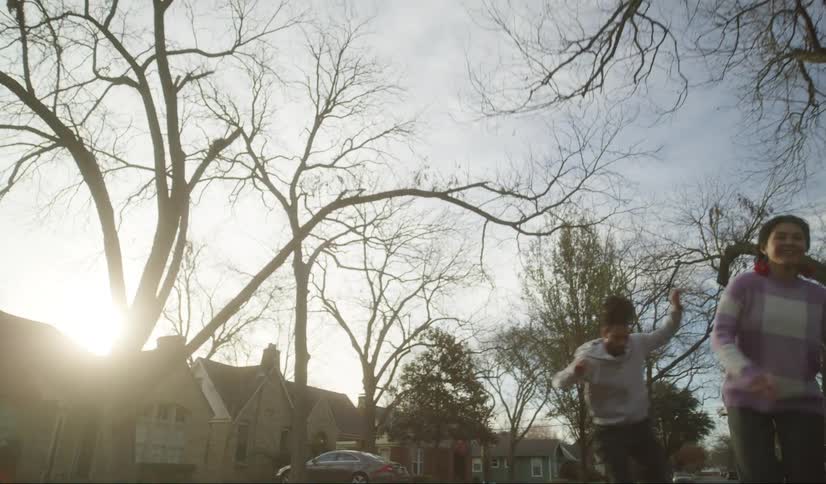 A group of people skateboarding together