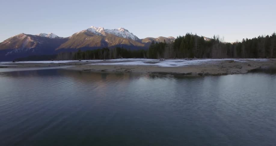 A mountainside landscape in the winter time