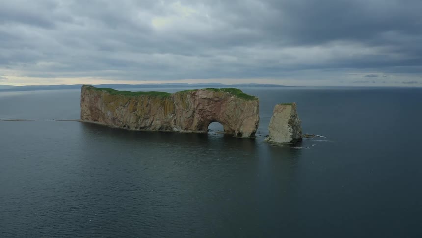 Stone islands sit surrounded by water