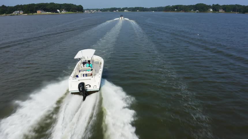 Boats are racing in the water