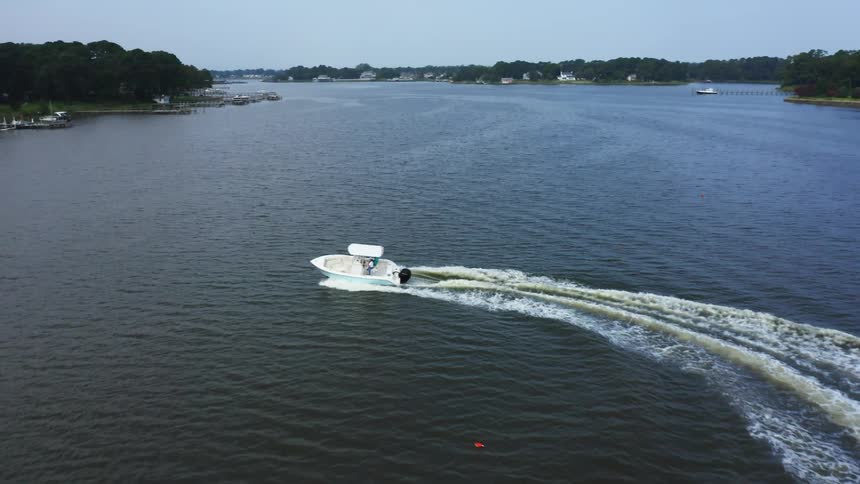 A view of a boat sailing on the water