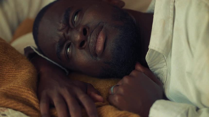 A man is woken up by dripping water