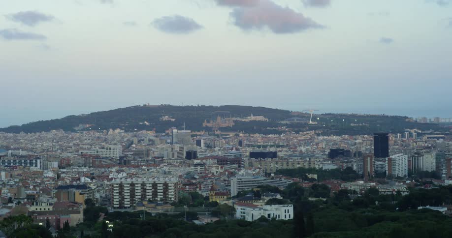 A wide look at a city shot with multiple buildings visible at a distance